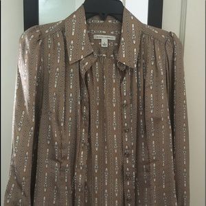 Satin button up blouse.